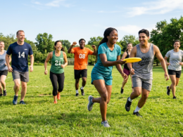 A group of adults playing a recreational team sport on a sunny field