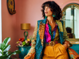 Woman in a bold maximalist colorful outfit as quiet luxury fashion fades