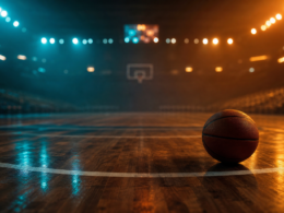 Angel Reese storyline shown by a basketball resting on a hardwood court under split teal and amber arena light