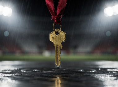 Big Brother 28 Episode 14 recap image showing a brass house key on a red ribbon resting on a wet metal platform under stadium floodlights