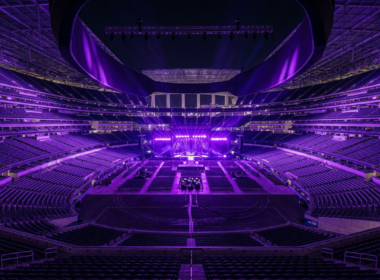 BTS AT&T Stadium concept: a giant stadium filled with purple concert lights at night