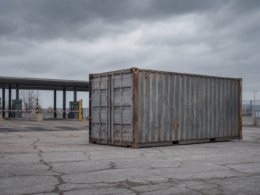 Canada 50 percent tariffs concept, lone shipping container at an empty border crossing