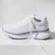 Dicks Sporting Goods stock drop, single white running shoe on white with one lace trailing loose
