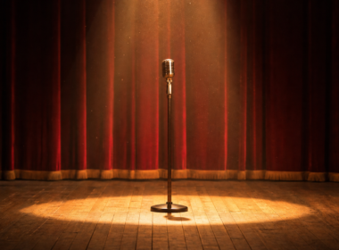 Dolly Parton tribute specials, empty stage with a scarlet curtain and one microphone in a spotlight