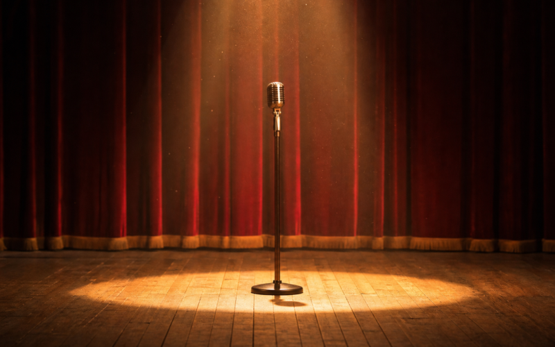 Dolly Parton tribute specials, empty stage with a scarlet curtain and one microphone in a spotlight