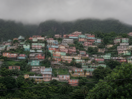 Haiti Kenscoff attack, brightly painted hillside houses stacked up a mountain under low grey cloud