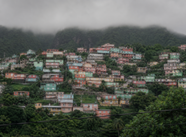 Haiti Kenscoff attack, brightly painted hillside houses stacked up a mountain under low grey cloud