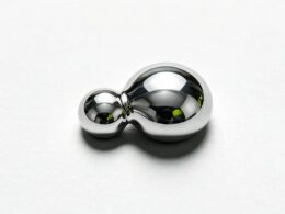 Nvidia Perplexity talks concept, macro of two mercury droplets merging on white