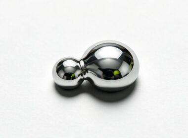 Nvidia Perplexity talks concept, macro of two mercury droplets merging on white