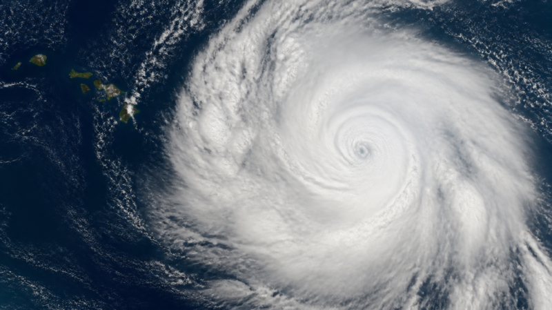 Tropical Depression Two C near Hawaii, spiral storm over the Pacific beside the islands