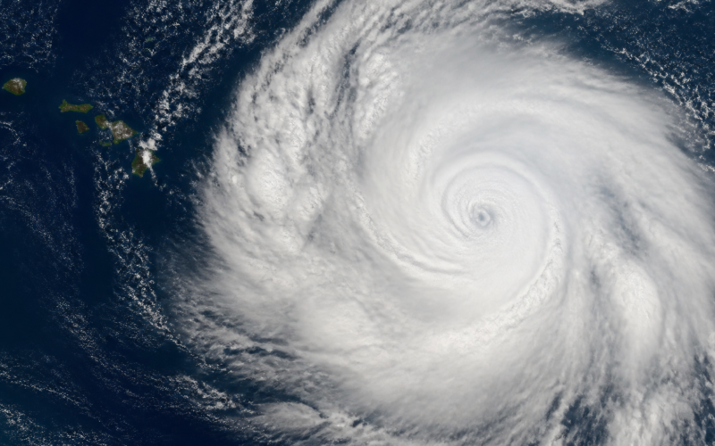 Tropical Depression Two C near Hawaii, spiral storm over the Pacific beside the islands